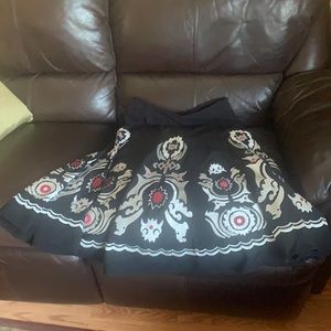 Block skirt with white paisley design with red highlights